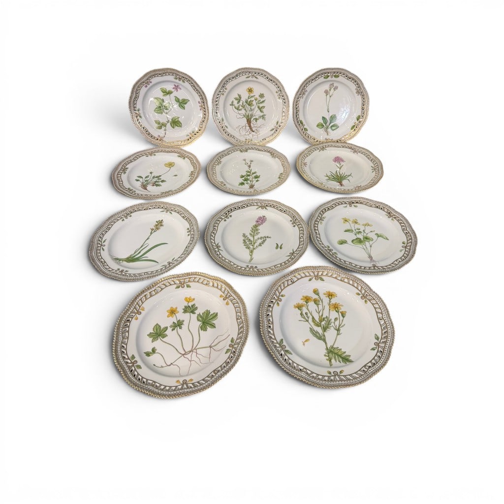 Set of Eleven Royal Copenhagen Flora Danica Porcelain Plates: Set of eleven Royal Copenhagen Flora Danica porcelain plates, each finely painted with a different botanical specimen and Latin plant name, including the example marked ?Anemone Vahlii Horn.? Each