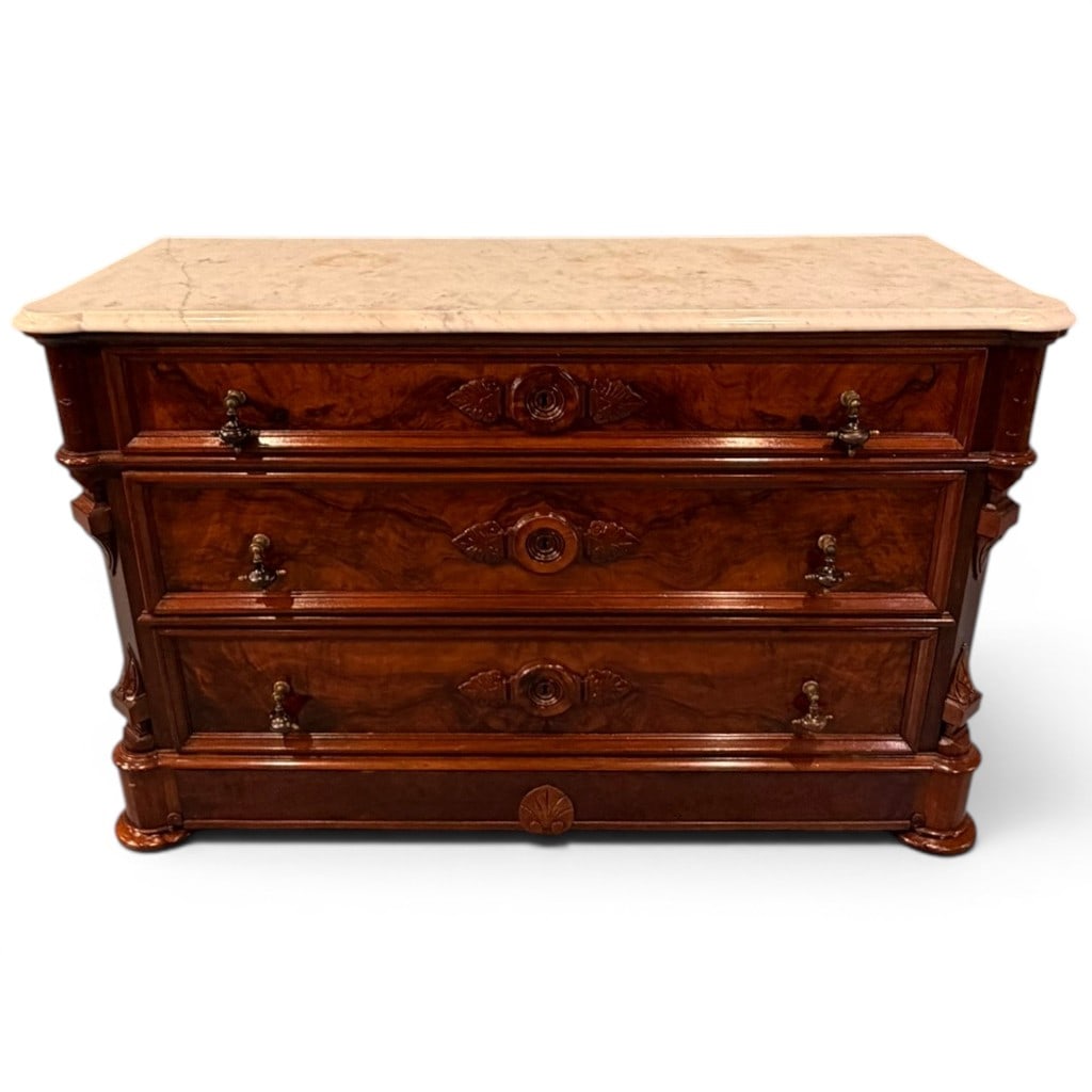 American Renaissance Revival Walnut Marble-Top Chest, circa 1870s: American Renaissance Revival marble-top chest of drawers, crafted in walnut with richly figured burled walnut drawer fronts and a shaped white marble top with rounded front corners. The case is