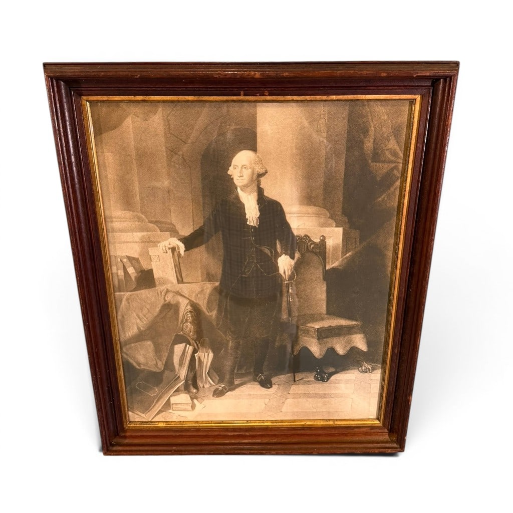 Framed George Washington Print After the Lansdowne Portrait: Framed George Washington print, after the full-length Lansdowne portrait type, depicting Washington standing in an interior with architectural columns, documents, chair, and sword. Housed under glass 