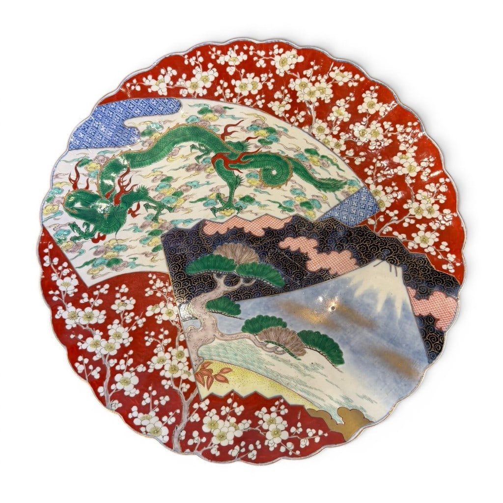 Large Japanese Imari Porcelain Charger with Dragon and Prunus Decoration: Large Japanese Imari porcelain charger or shallow dish, late 19th to early 20th century, of circular scalloped form decorated in a rich polychrome Imari palette. The central field is painted with shap