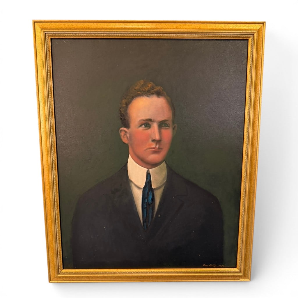 Cass Holly American Folk Art Portrait of a Gentleman, 1998: An American folk art oil on canvas portrait of a young gentleman, signed lower right ?Cass Holly? and dated 1998. The sitter is shown bust-length in formal Victorian-style dress, with dark coat,