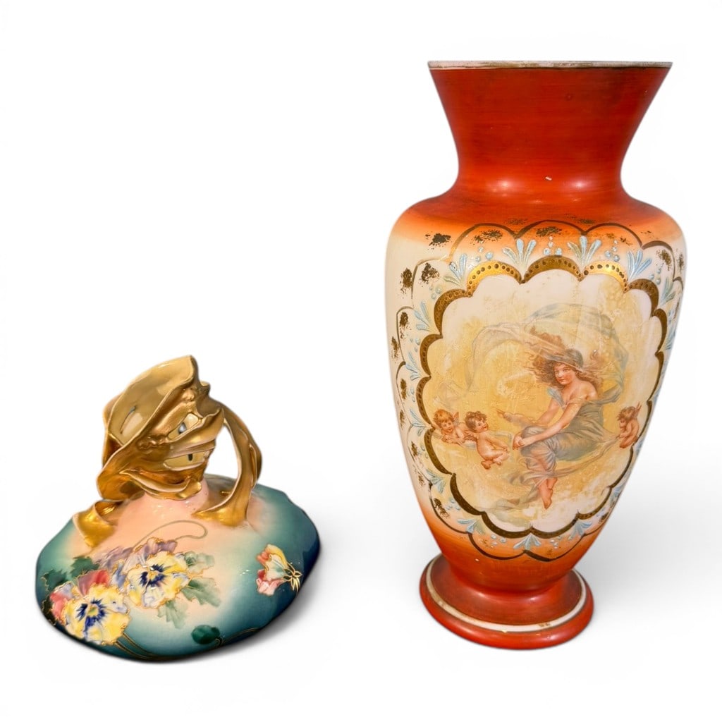 Grouping of Austrian/Vienna Porcelain Bowl and Vase: Grouping of two Austrian/Vienna-style porcelain pieces, including a red/orange ground vase with hand-painted classical maiden and cherub scene, gilt highlights, and flared rim; together with a low