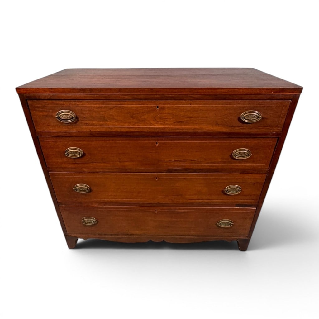 American Hepplewhite Cherry Inlaid Chest of Drawers, Early 19th Century: American Hepplewhite cherry chest of drawers, early 19th century, having a rectangular top above four graduated drawers with line inlaid borders, diamond-form inlaid escutcheons, oval brass pulls, and