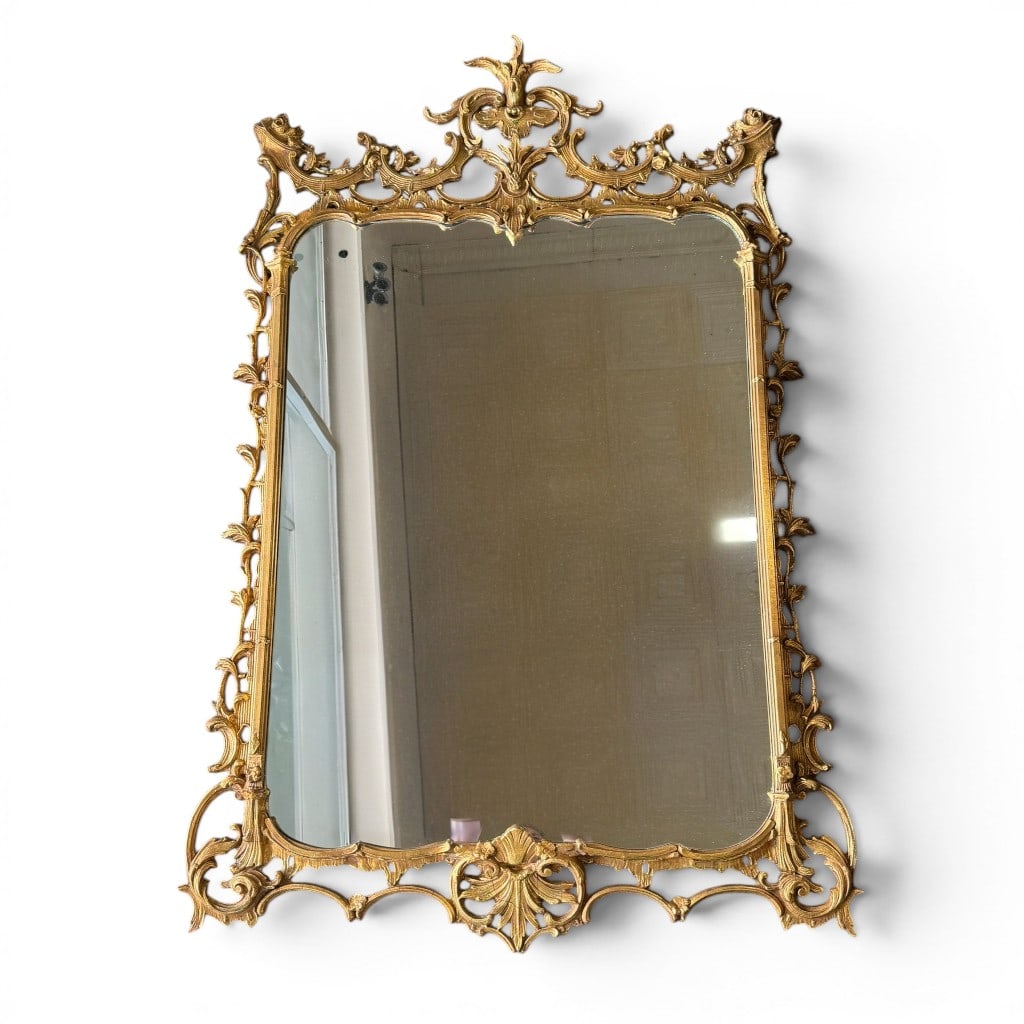 Large French Gilt Mirror, Louis XV/Rococo Revival Style: Large French giltwood and composition mirror, Louis XV/Rococo Revival style, with elaborate pierced foliate and scroll crest, shaped upper frame, scrolling side supports, shell and acanthus decoration
