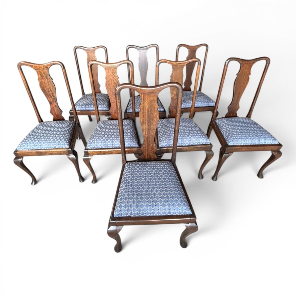 Set of Eight Queen Anne Style Dining Chairs, 19th C.: Set of eight Queen Anne style walnut or mahogany dining chairs, Late 19th century, each with shaped yoke crest, vasiform splat, rounded stiles, slip seat upholstered in blue patterned fabric, shaped s