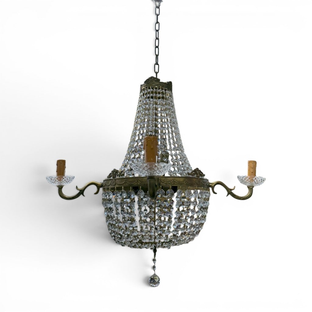 French Three-Light Crystal Basket Chandelier: French style three-light gilt metal and crystal basket chandelier, likely early to mid-20th century, having a pierced gilt metal frame with draped crystal beading, cut crystal drops, central basket-fo