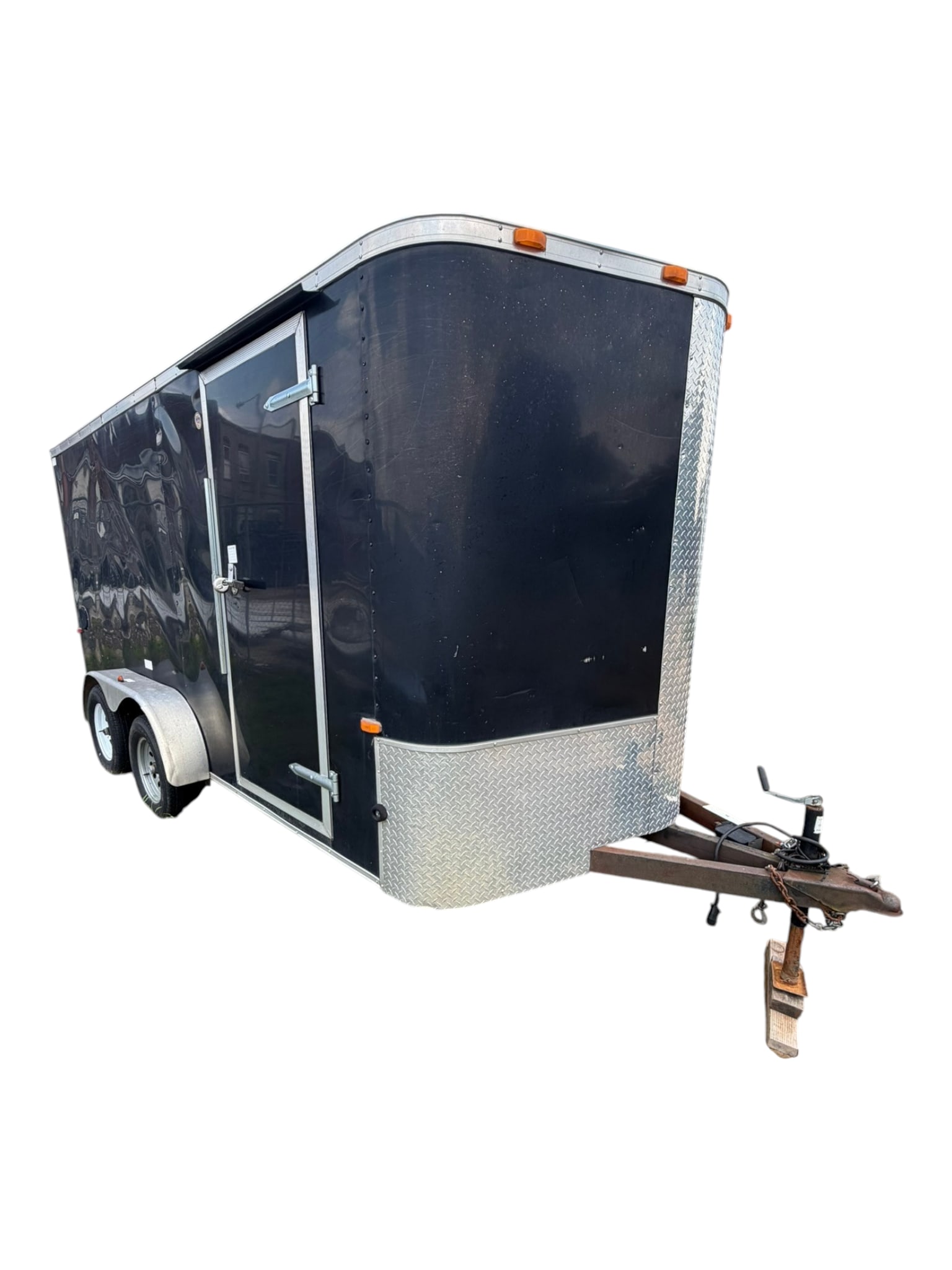 2016 Cargo Craft Enclosed Tandem-Axle Cargo Trailer: Black enclosed cargo trailer manufactured by Cargo Craft, Inc., VIN 4D6EB162XHA038297, manufactured November 2016. Approximate 7 ft. x 16 ft. enclosed body with tandem 3,500 lb. axles (7,000 lb. GVWR)