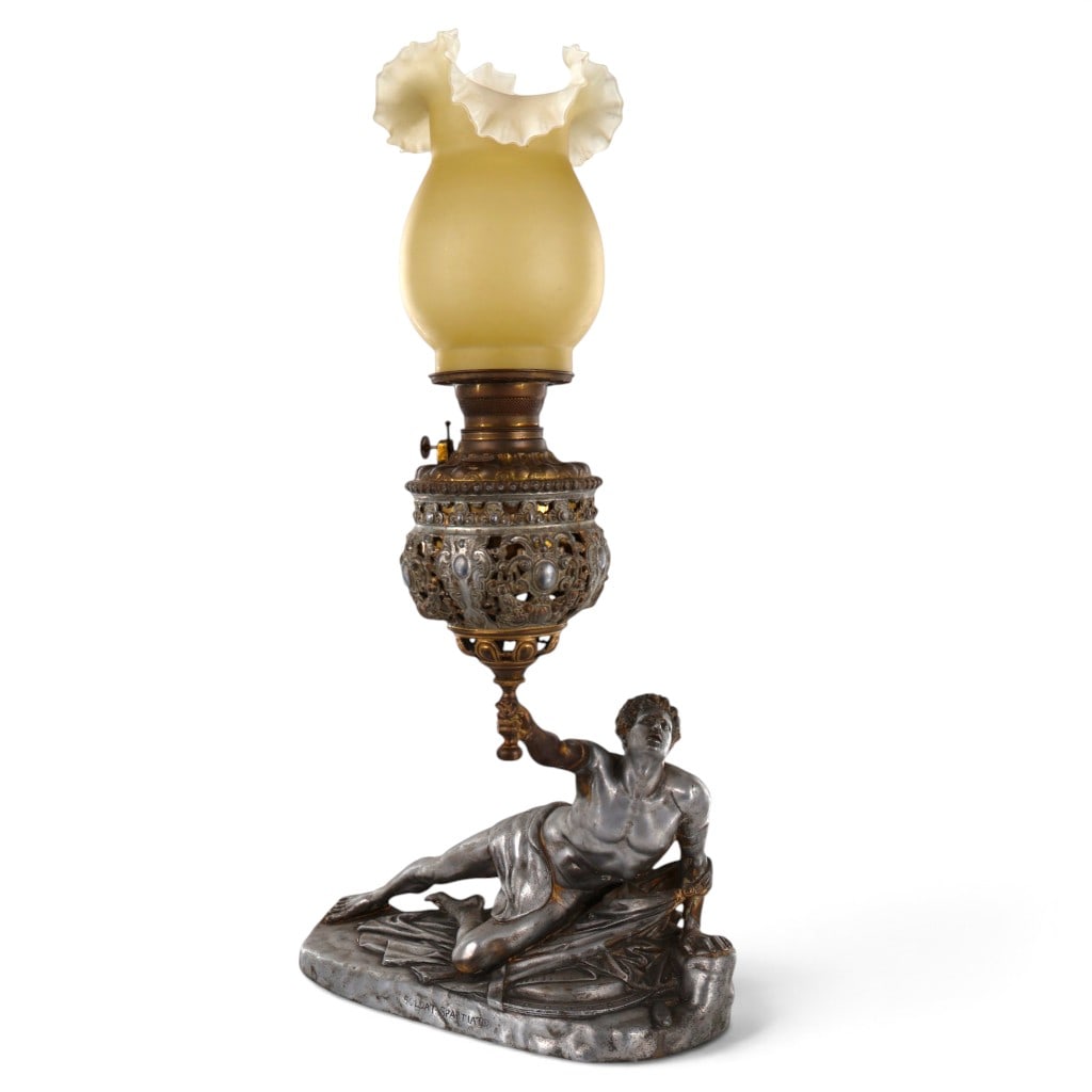 Bradley & Hubbard Soldat Spartiate Figural Oil Lamp: Maker: Bradley & Hubbard Manufacturing Company, Meriden, ConnecticutDate: Circa 1880-1890Period/Style: Victorian, Neoclassical RevivalMaterials: Silvered cast spelter or zinc alloy, brass-toned metal,