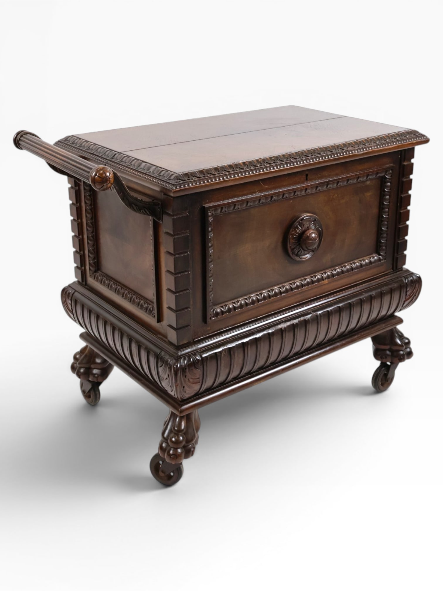Regency Revival Carved Mahogany Bar Trolley on Paw-Foot Casters: Origin: Probably EnglandDate: Early to mid-20th centuryPeriod/Style: Regency RevivalMaterials: Mahogany and mahogany veneer, secondary woods, faux-marble panels, painted metal liner, and metal hardwar
