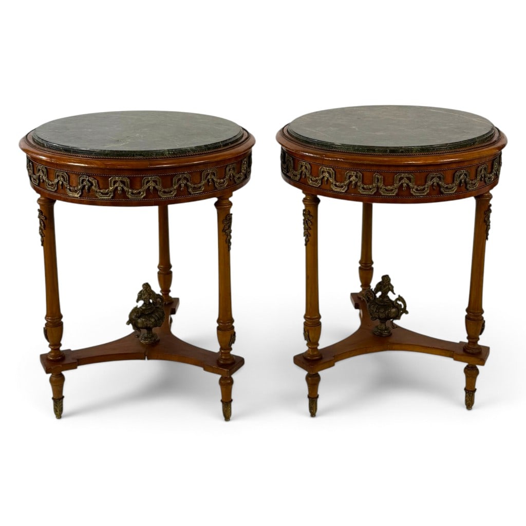 Pair Continental Marble-Top Gueridons: Origin: Continental Europe, probably ItalyDate: Circa 1890-1910Period/Style: Louis XVI Revival, Neoclassical RevivalMaterials: Mahogany and mahogany veneer, green marble, and gilt-metal mountsForm: Pa