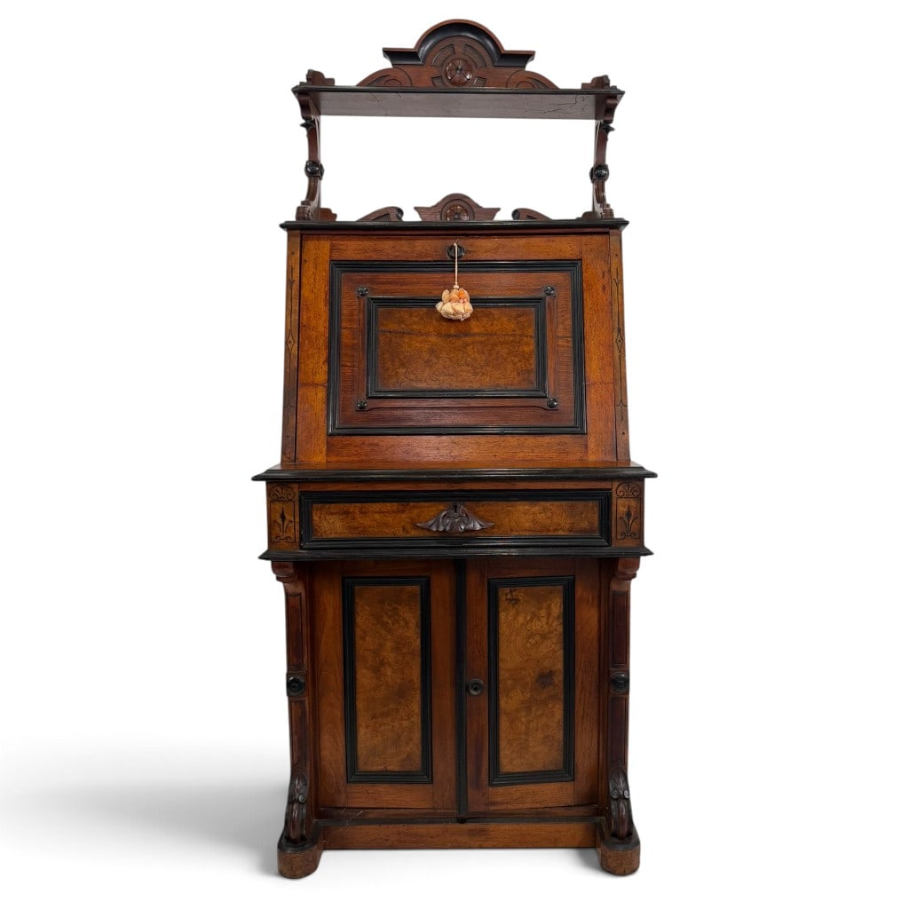 Victorian Eastlake Walnut and Burl Secretary Desk: Origin: AmericanDate: Circa 1880-1890Period/Style: Victorian, Eastlake and Aesthetic MovementMaterials: Black walnut, burl walnut veneer, ebonized wood, unidentified secondary woods, metal hardware,