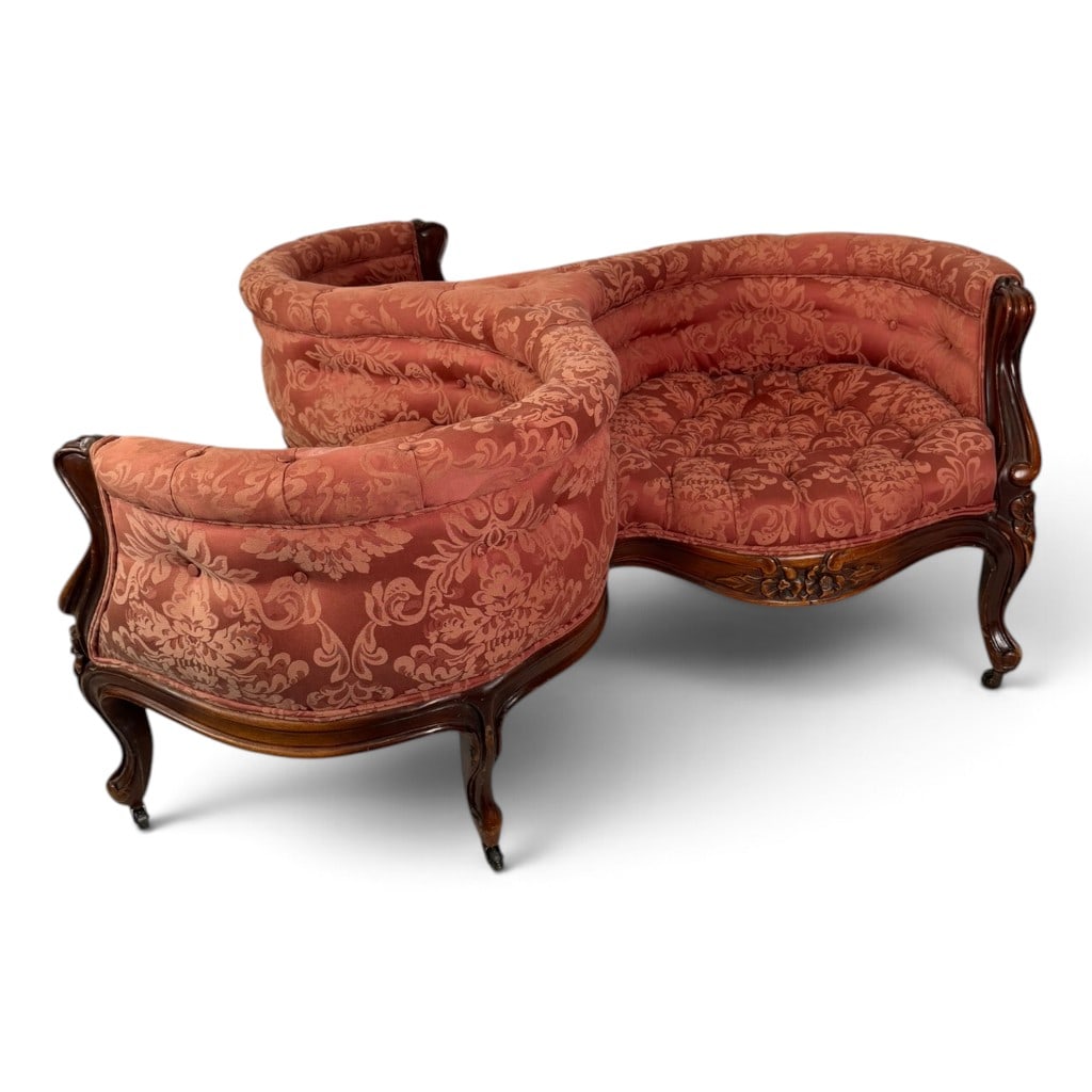 Napoleon III Mahogany Indiscret Sofa: Origin: Probably FranceDate: Circa 1860-1875Period/Style: French Second Empire, Napoleon III, Rococo Revival tasteMaterials: Mahogany, mixed secondary woods, later damask upholstery, upholstery button
