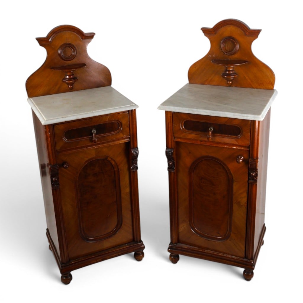 Pair Italian Walnut Marble Top Commodes: Origin: Probably ItalyDate: Circa 1870-1890Period/Style: Italian Renaissance Revival with Louis Philippe influenceMaterials: Walnut and figured walnut veneer, white marble, brass hardware, and pine se