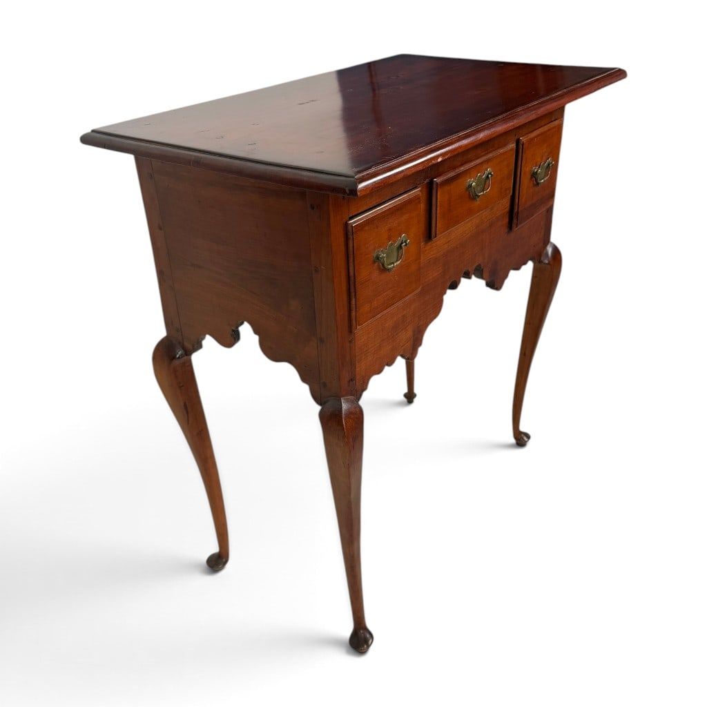 Queen Anne Walnut Dressing Table: Origin: Probably New England, possibly Boston, MassachusettsDate: Circa 1750Period/Style: American Queen AnneMaterials: Walnut, secondary woods, and brass hardwareForm: Dressing table or