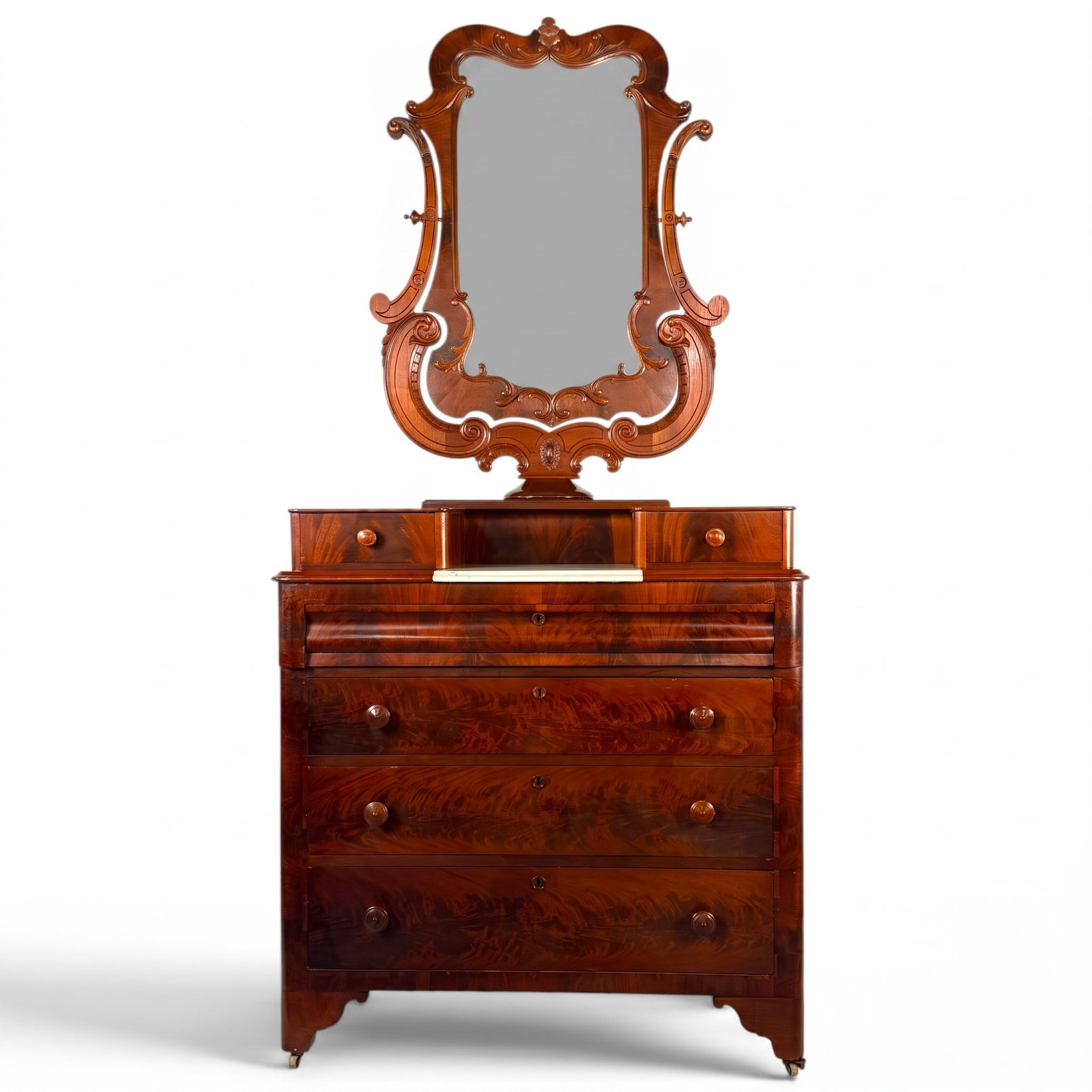 Attr.Thomas Day Dressing Bureau: Maker: Attributed to Thomas Day (1801-1861)Origin: Milton, North CarolinaDate: Circa 1850Period/Style: Late ClassicalMaterials: Figured mahogany and mahogany veneer, white marble, mirror glass, metal 