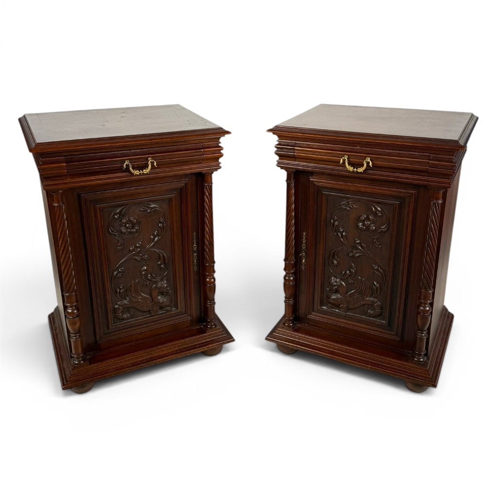 Pair French Walnut Griffin Bedside Cabinets: Origin: Probably FranceDate: Circa 1880-1900Period/Style: Renaissance Revival in the Henri II tasteMaterials: Walnut and walnut veneer, brass hardware, and unidentified secondary woodsForm: Pair of
