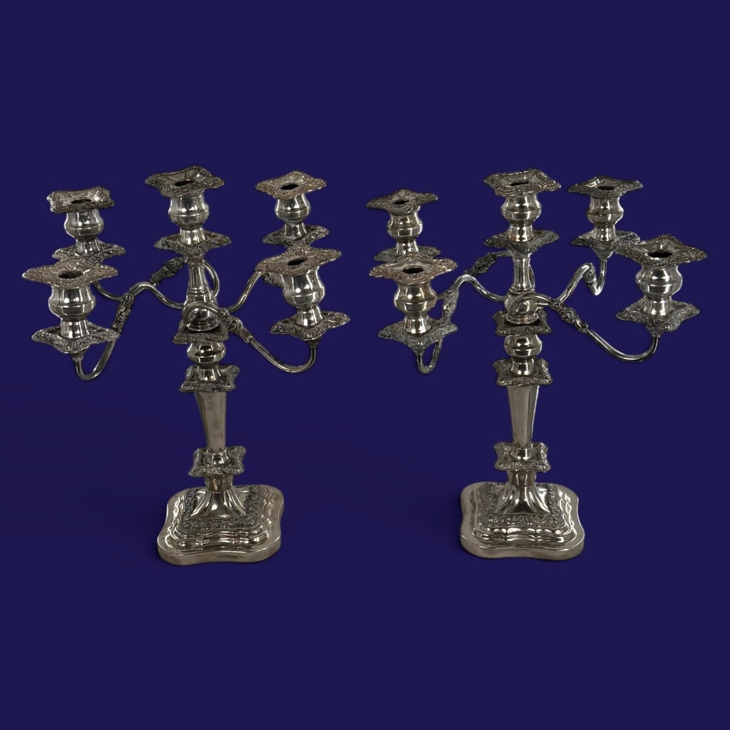 Pair Birmingham Silver Co. Candelabra: Maker: Birmingham Silver CompanyOrigin: Connecticut, United StatesDate: Mid-20th centuryPeriod/Style: Georgian and Rococo RevivalMaterials: Silverplate over copperForm: Convertible five-light