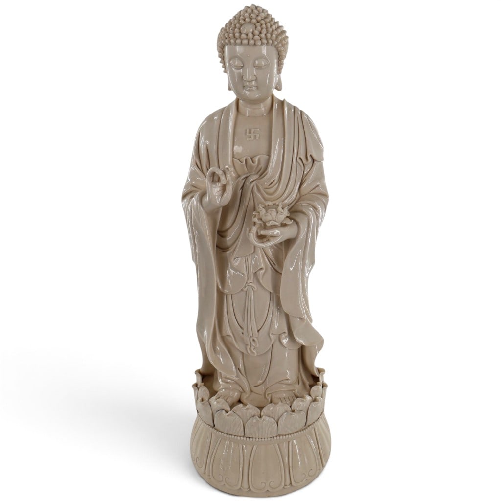 Large Dehua Blanc-de-Chine Standing Buddha: Maker: Unidentified Dehua workshop; bearing Xu Yunlin-type sealsOrigin: Dehua, Fujian Province, ChinaDate: Late Qing dynasty to Republic period, circa 1900-1940Period/Style: Chinese Dehua blanc-de-Chi