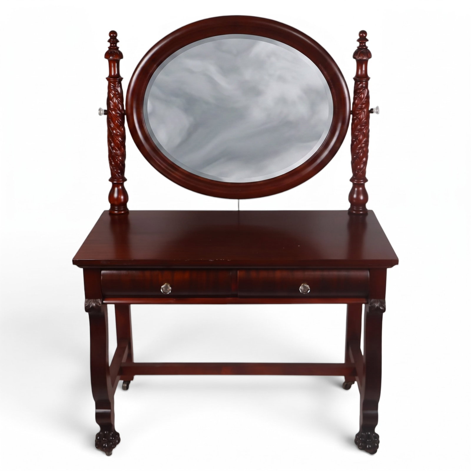 American Classical Mahogany Dressing Table: Origin: American, probably Northeastern United StatesDate: Circa 1825-1840Period/Style: American ClassicalMaterials: Mahogany and mahogany veneer, secondary woods, mirror glass, and metal castersForm: