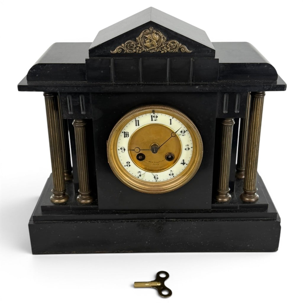 French Black Slate Architectural Clock: Origin: FranceDate: Circa 1880-1900Materials: Black slate or marble, gilt metal, enamel, brass, and glassDescription: French architectural mantel clock, circa 1880-1900, housed in a substantial black