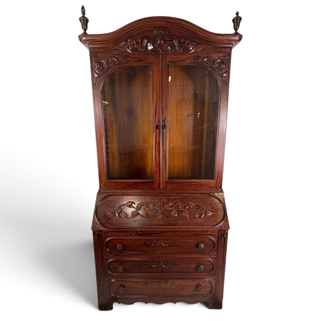 Probably American Rococo Revival Rosewood Secretary Bookcase, Circa 1860-1875: Origin: Probably American Date: Circa 1860-1875 Period/Style: American Rococo Revival Materials: Rosewood, rosewood veneer, pine and mixed secondary woods, glass, green felt, metal hardware, and flora