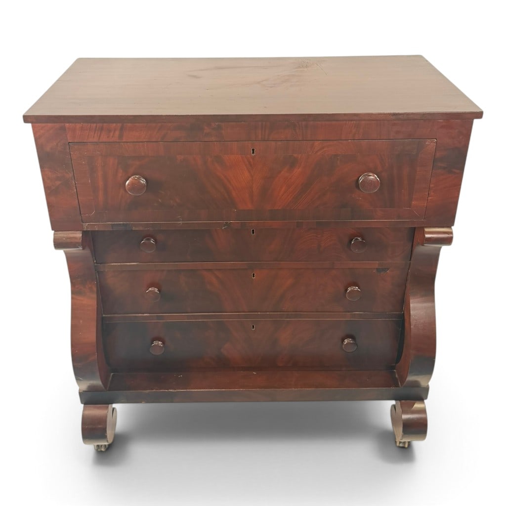 American Late Classical Figured Mahogany Chest of Drawers, Hunt-Phelan Provenance, c. 1840: Origin: American, possibly Southern. Date: Circa 1840. Period/Style: Late Classical. Materials: Figured mahogany, mahogany veneer, mixed secondary woods, brass, and metal. Form: Chest of drawers.