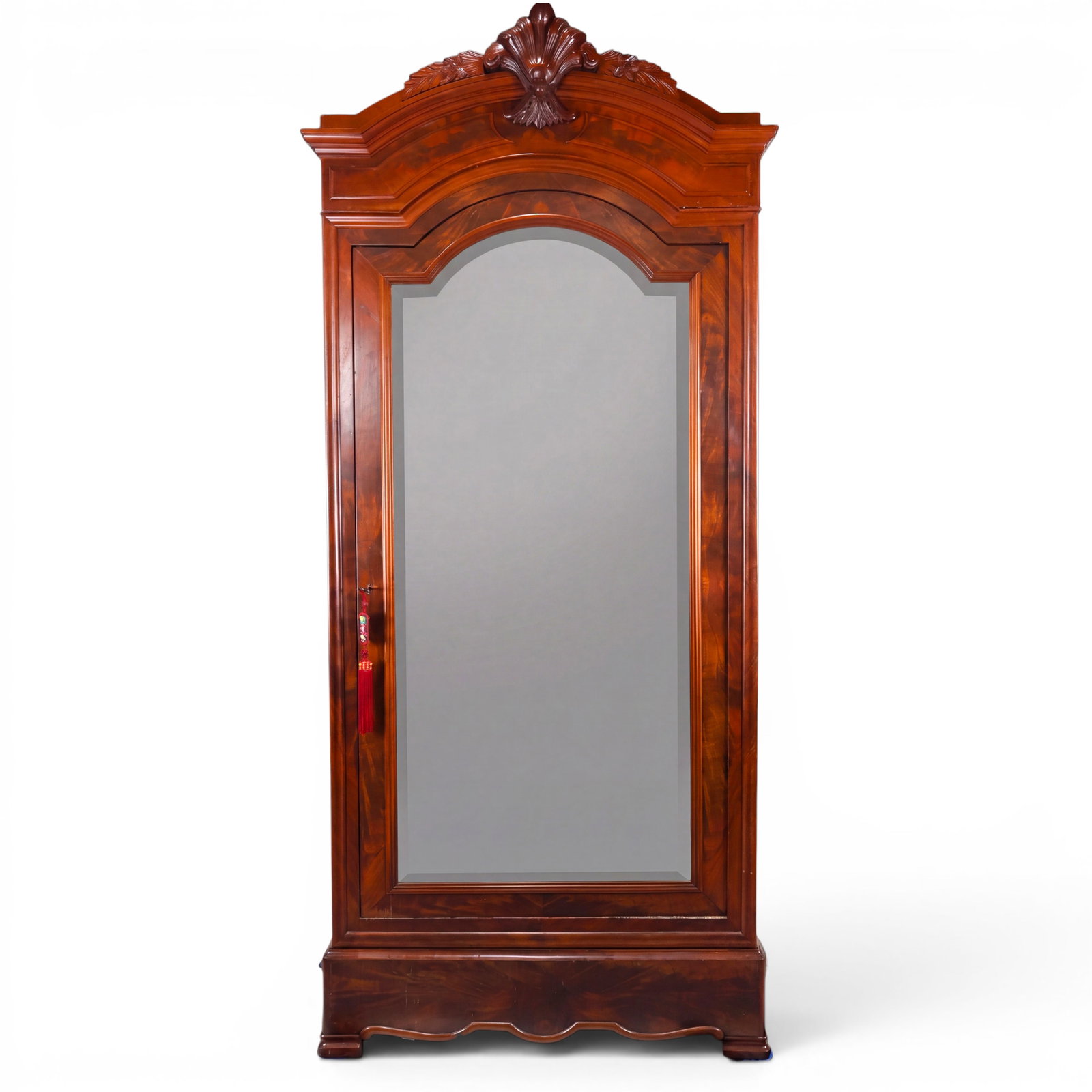 Victorian Mahogany Mirrored Wardrobe: Origin: England Date: Circa 1860-1880 Period/Style: Victorian Materials: Mahogany, mahogany veneer, oak secondary wood, mirror glass, and brass Form: Single-door wardrobe or linen press Description