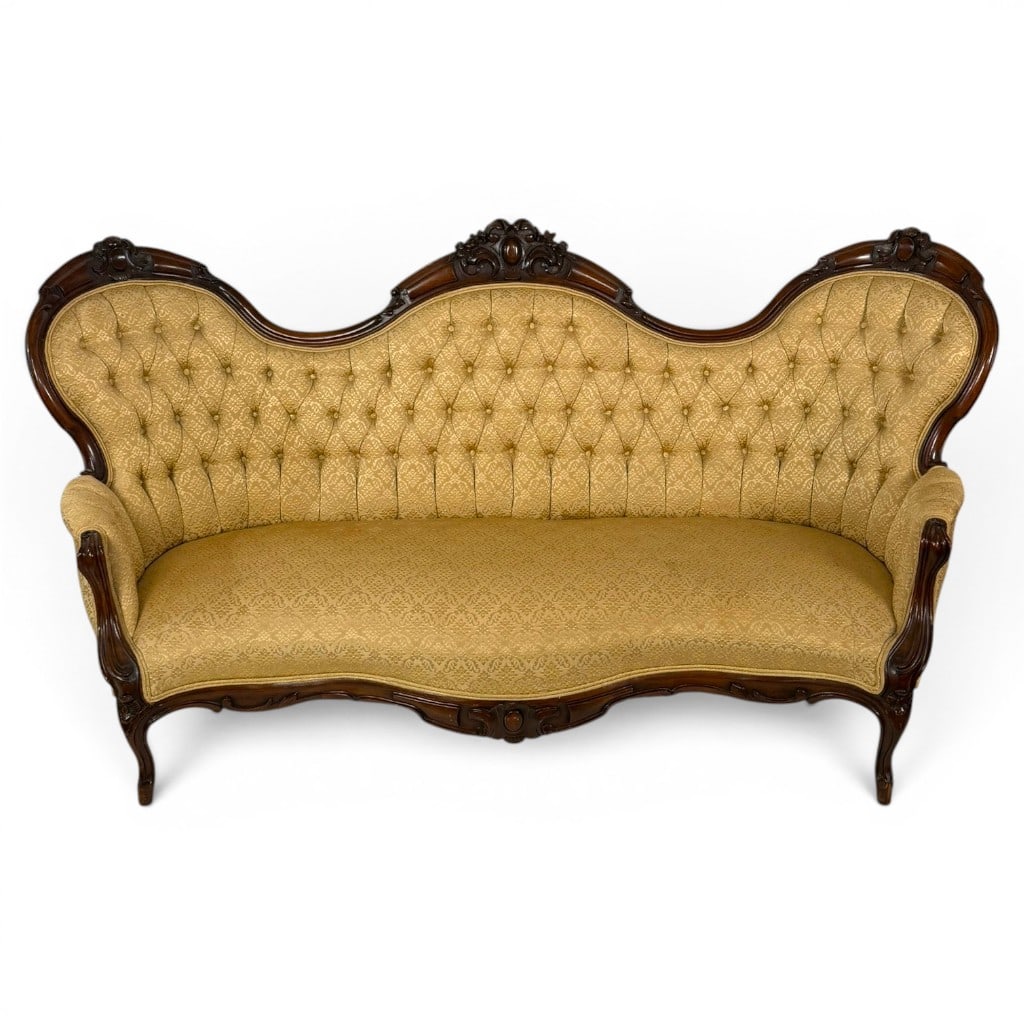 Rococo Revival Walnut Triple-Back Sofa: Origin: American Date: Circa 1860-1875 Period/Style: American Rococo Revival Materials: Walnut and upholstered textile Description: American Rococo Revival carved walnut sofa, circa 1860-1875. The ser
