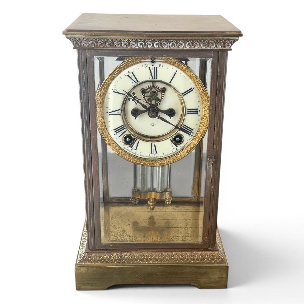 Ansonia Four-Glass Crystal Regulator: Maker: Ansonia Clock Company Origin: New York Date: Circa 1900-1910 Materials: Brass, beveled glass, enamel, steel, and glass Form: Four-glass crystal-regulator mantel clock Description: American