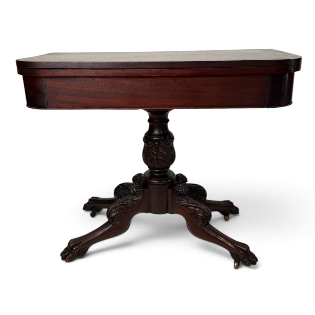American Classical Carved Mahogany Card Table, Probably New York: Origin: American, probably New York Date: Circa 1820-1830 Period/Style: Classical Materials: Mahogany, mahogany veneer, brass, and mixed secondary woods Description: Nicely carved American Classical