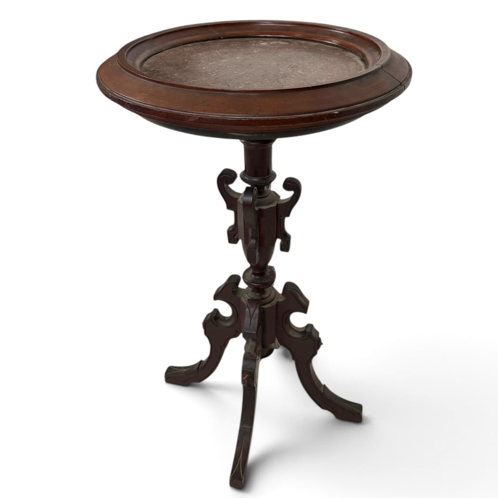 American Renaissance Revival Walnut Marble-Top Plant Stand: Origin: American Date: Circa 1870-1885 Period/Style: Renaissance Revival Materials: Walnut and mottled burgundy-gray marble Description: An American Renaissance Revival plant stand in carved walnut.