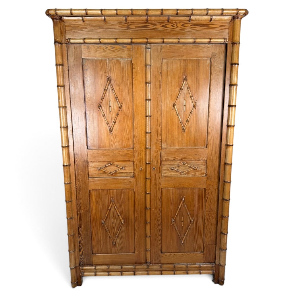 English Aesthetic Movement Bamboo Wardrobe: Origin: Probably England Date: Circa 1880-1900 Period/Style: Victorian, Aesthetic Movement, Japonisme Materials: Pine, bamboo, split bamboo, mixed secondary woods, and metal hardware Form: Two-door