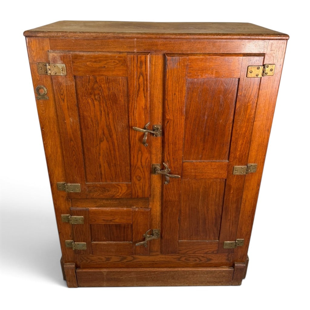 North Pole Oak Ice Box: Maker: North Pole, manufacturer unconfirmed Origin: American Date: Circa 1900-1915 Period/Style: Late Victorian, early twentieth-century utility furniture Materials: Oak, pine and mixed secondary wood