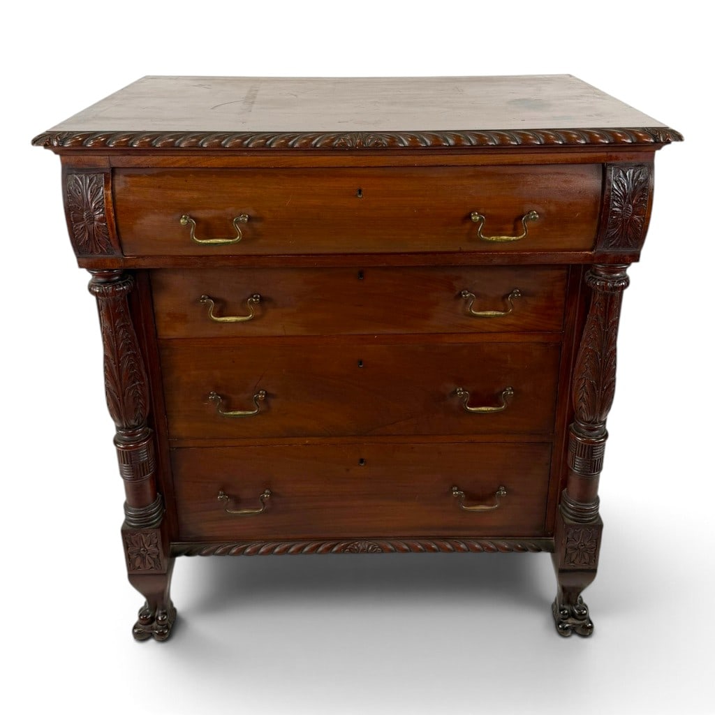 American Late Classical Carved Mahogany Chest of Drawers: Origin: American Date: Circa 1835-1845 Period/Style: Late Classical Materials: Mahogany, mahogany veneer, mixed secondary woods, and brass hardware Form: Chest of drawers Description: An American