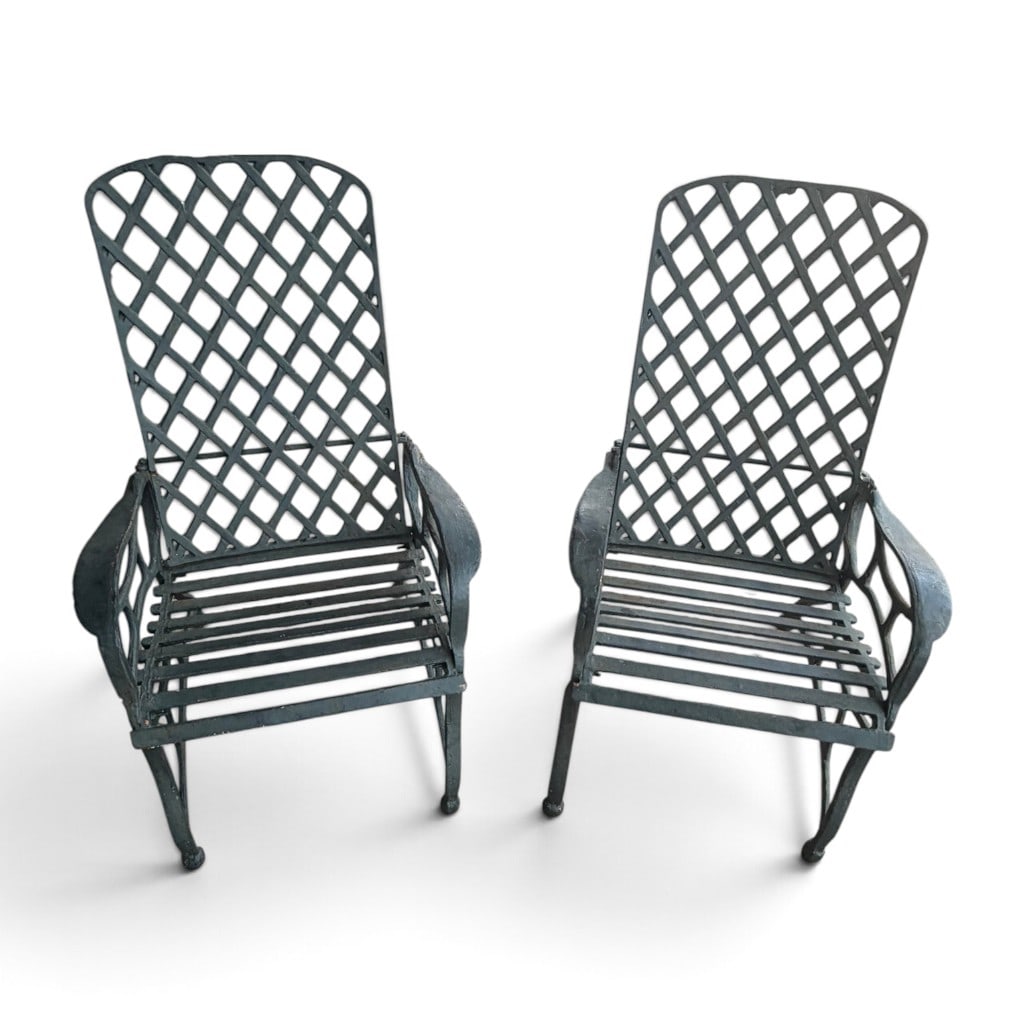Pair Patinated Bronze Lattice Garden Chairs: Origin: Unidentified Date: 20th century Period/Style: Traditional garden furniture Materials: Cast bronze and metal fasteners Form: Pair of high-back garden armchairs Description: A pair of sub