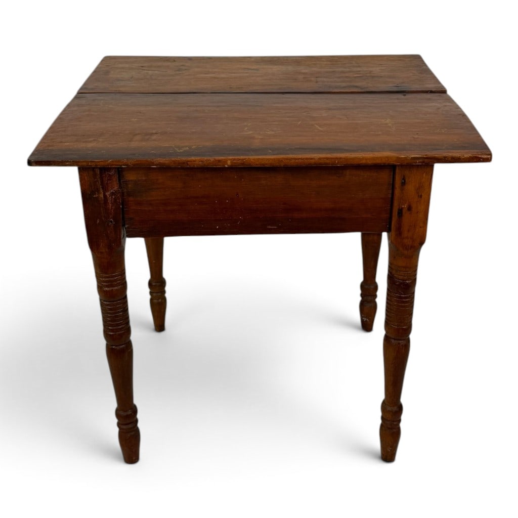 American Country Mixed-Wood Stand Table: Origin: American Date: Circa 1850-1880 Period/Style: Country, Vernacular Materials: Pine and mixed hardwoods Form: Stand or utility table Description: An American country stand or utility table