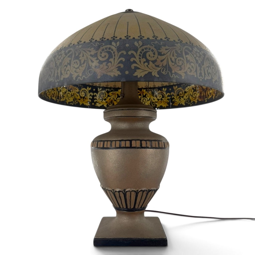 Handel 6768 Reverse-Painted Glass Table Lamp: Origin: American, Meriden, Connecticut Date: Circa 1920s Period/Style: Late Arts and Crafts / Art Deco Maker: Handel Company Materials: Reverse-painted glass and patinated cast metal Form: Two-light