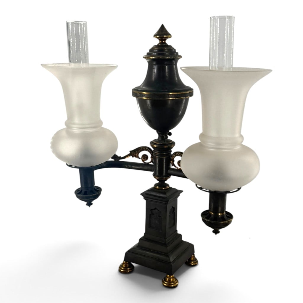 Classical Double-Arm Argand Lamp, Electrified: Date: Second quarter 19th century Period/Style: Classical Revival Materials: Patinated and gilt metal, frosted glass, clear glass Form: Double-arm Argand table lamp, later electrified Description: A