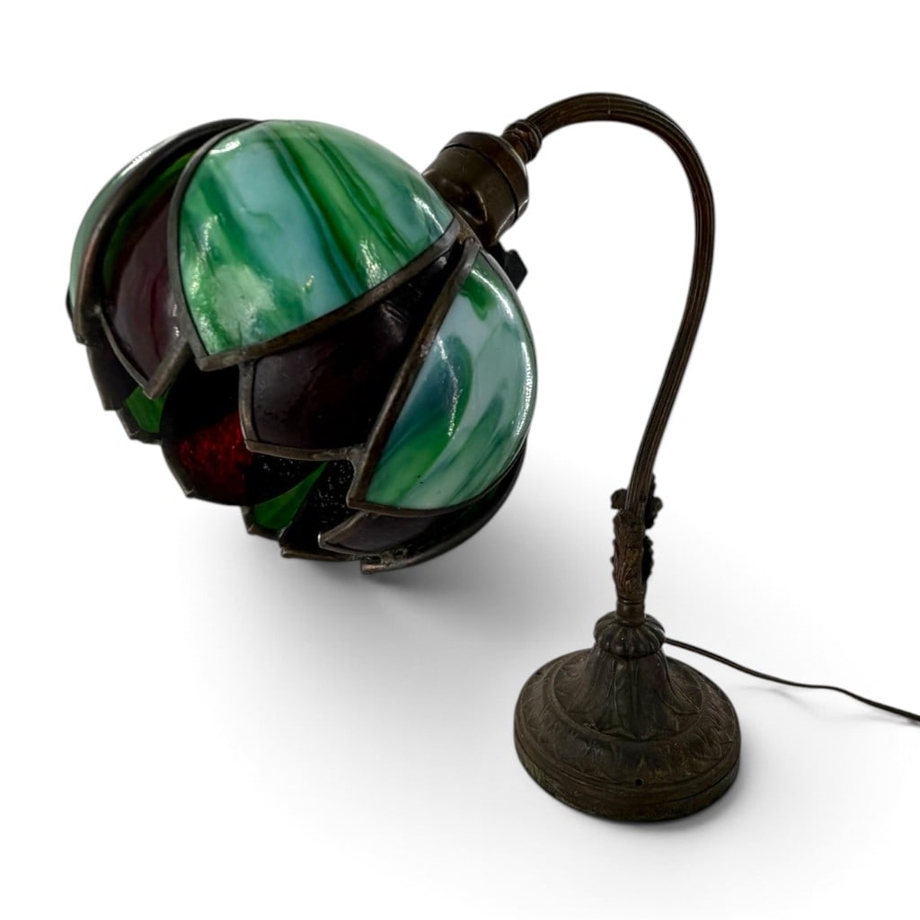 Handel Art Nouveau Leaded Glass Desk Lamp: Origin: Meriden, Connecticut Date: Circa 1910 Period/Style: Art Nouveau, Arts and Crafts Maker: Handel Lamp Company Materials: Leaded opalescent slag glass, patinated metal, and electrical components
