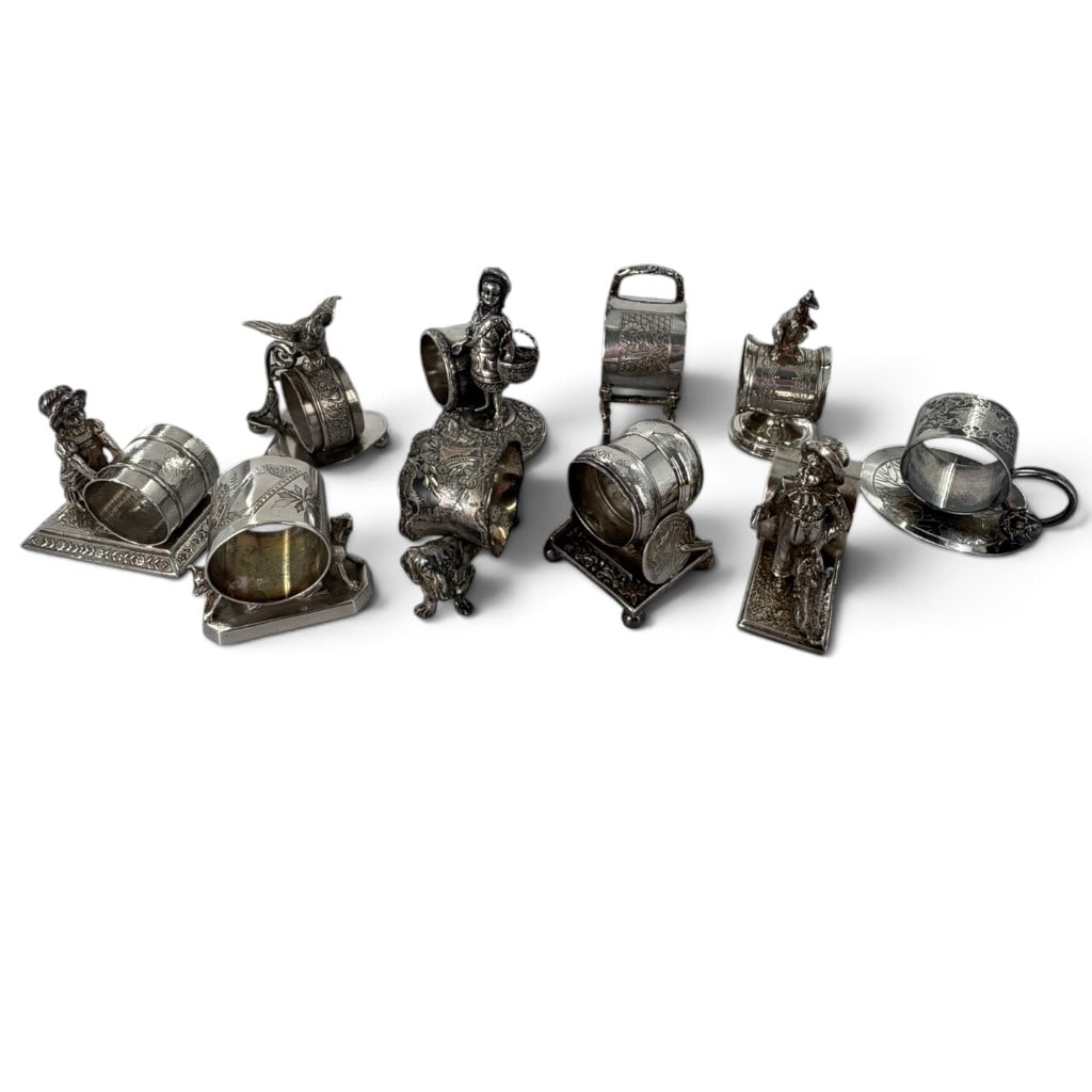 Ten Victorian Silverplate Napkin Rings: Origin: American and English Date: Late 19th to early 20th century Period/Style: Victorian and Aesthetic Movement Maker: Various, including Pairpoint Mfg. Co., Aurora Silver Plate Co., Rogers, Smith