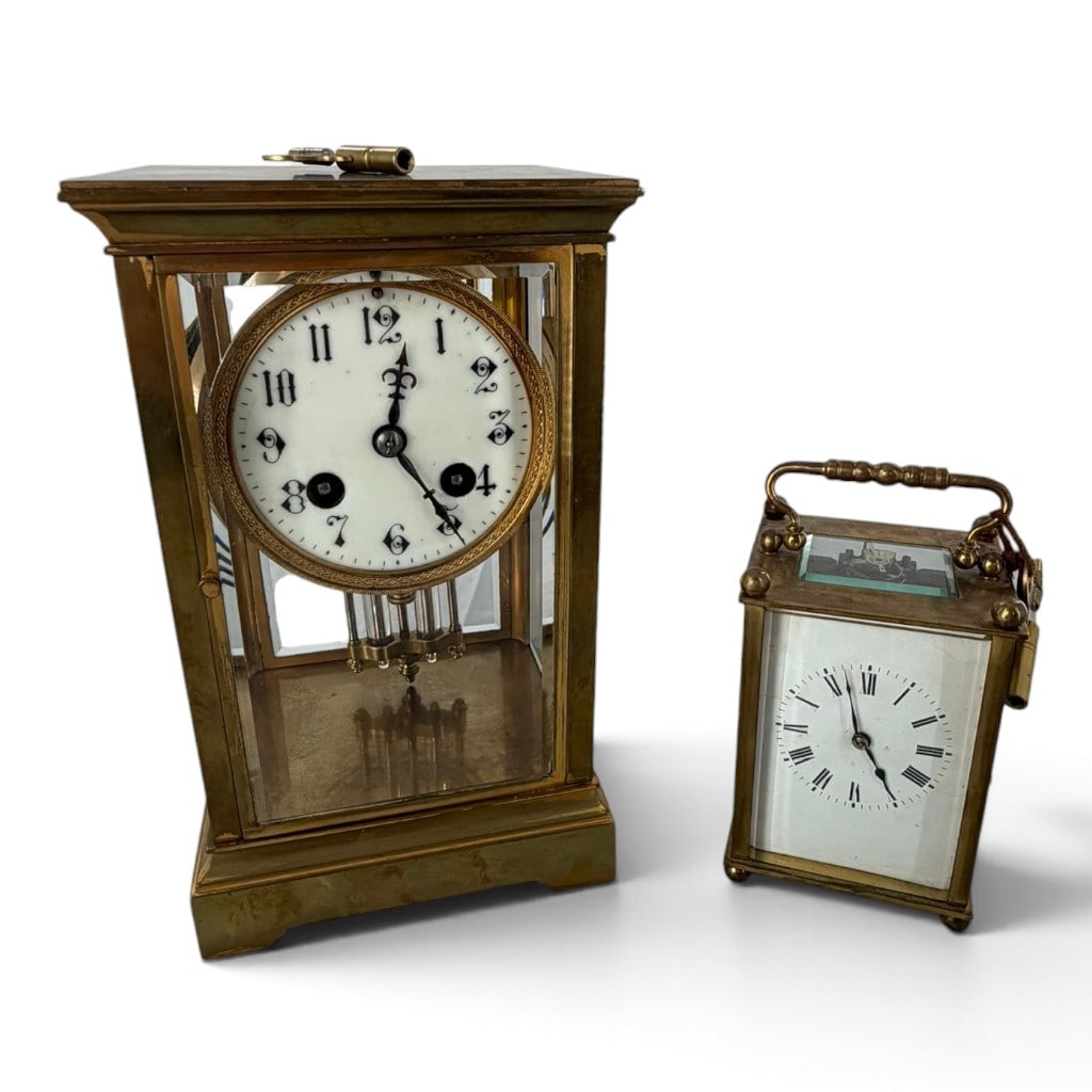 French Crystal Regulator and Carriage Clock: Origin: France Date: Circa 1900 Period/Style: Belle Epoque Maker: Unidentified Materials: Brass, beveled glass, enamel, steel, and mercury pendulum Form: Crystal regulator mantel clock and carriage
