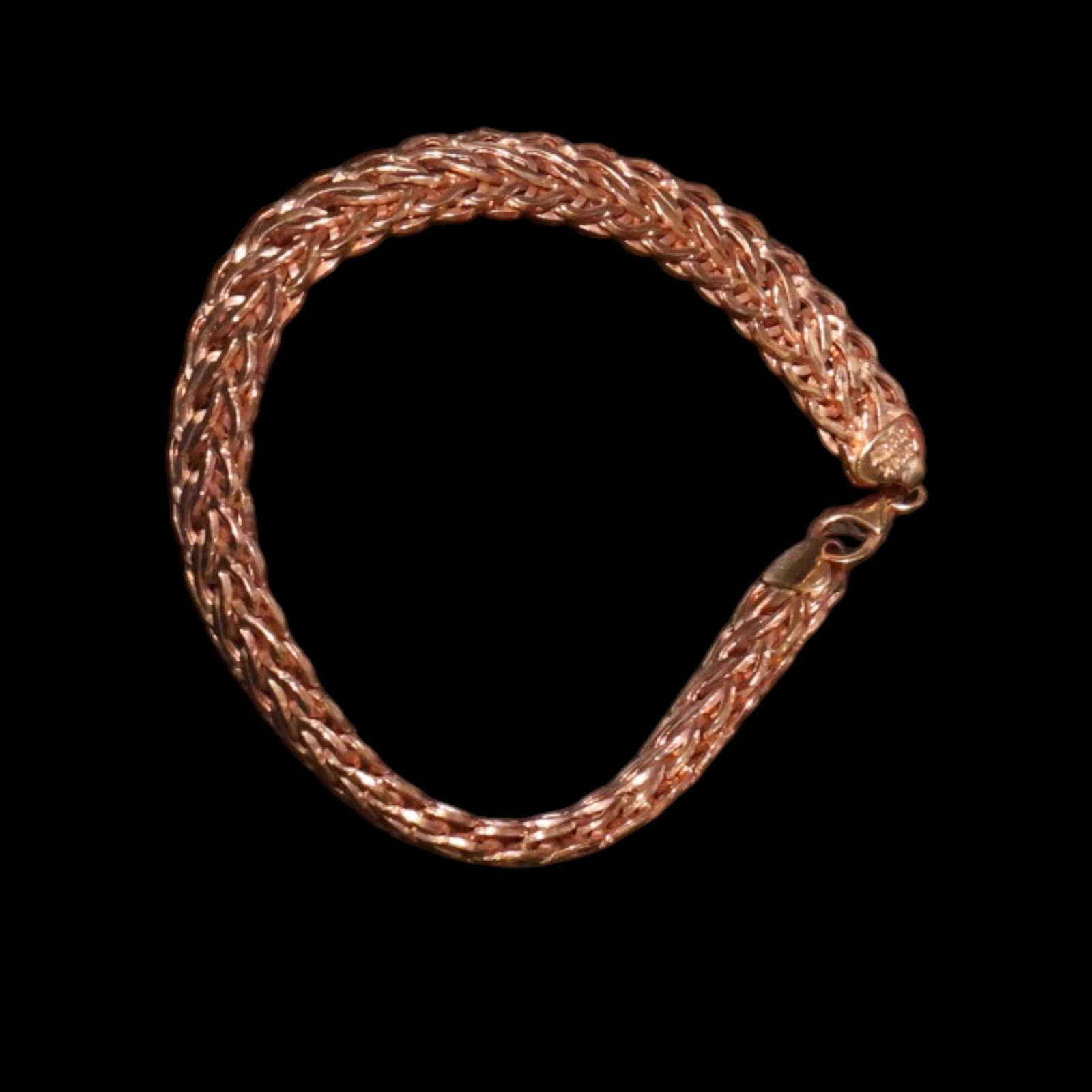 14K Rose Gold Bracelet: Date: Late 20th to early 21st century Materials: 14K rose gold Form: Link bracelet Description: A 14K rose gold bracelet composed of articulated polished links and fitted with a clasp. Dimensions: