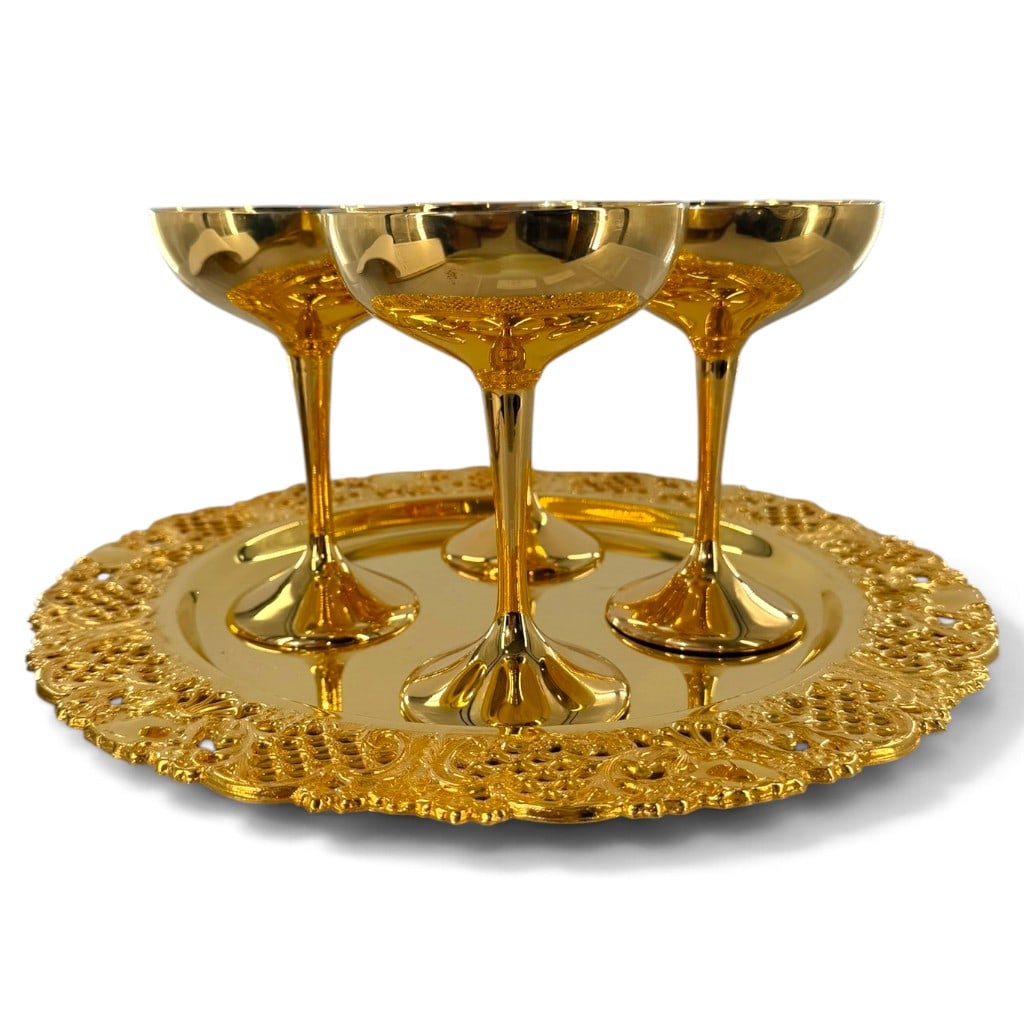 International Silver Gold Electroplate Bar Set: Origin: American Date: Mid to late 20th century Period/Style: Hollywood Regency Maker: International Silver Company Materials: Base metal electroplated with 24-karat gold Form: Four goblets and