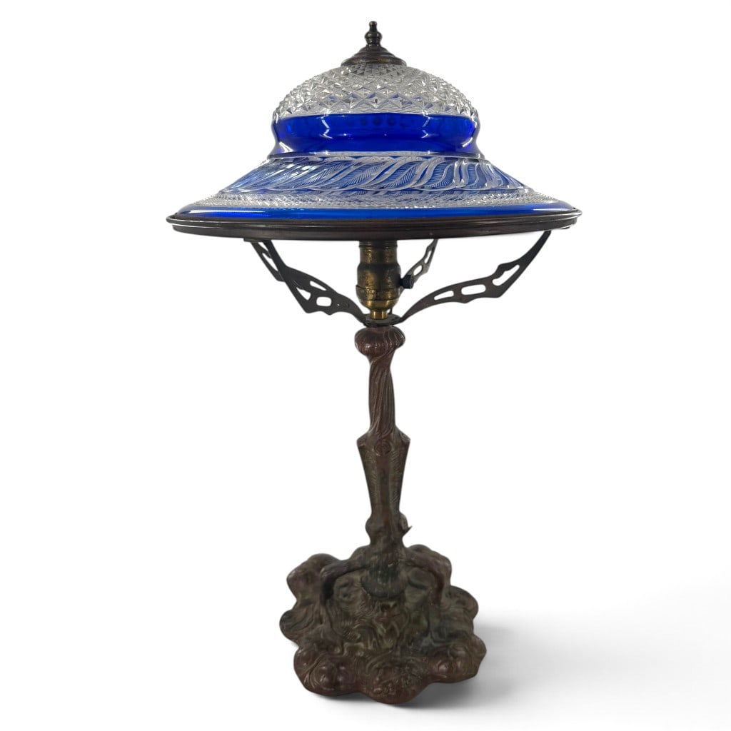 Art Deco Cobalt Cut Glass Table Lamp: Origin: Probably American with a Bohemian-style shade Date: Early to mid-20th century, assembled Period/Style: Art Deco with Art Nouveau elements Maker: Unmarked Materials: Cobalt-blue and clear cut