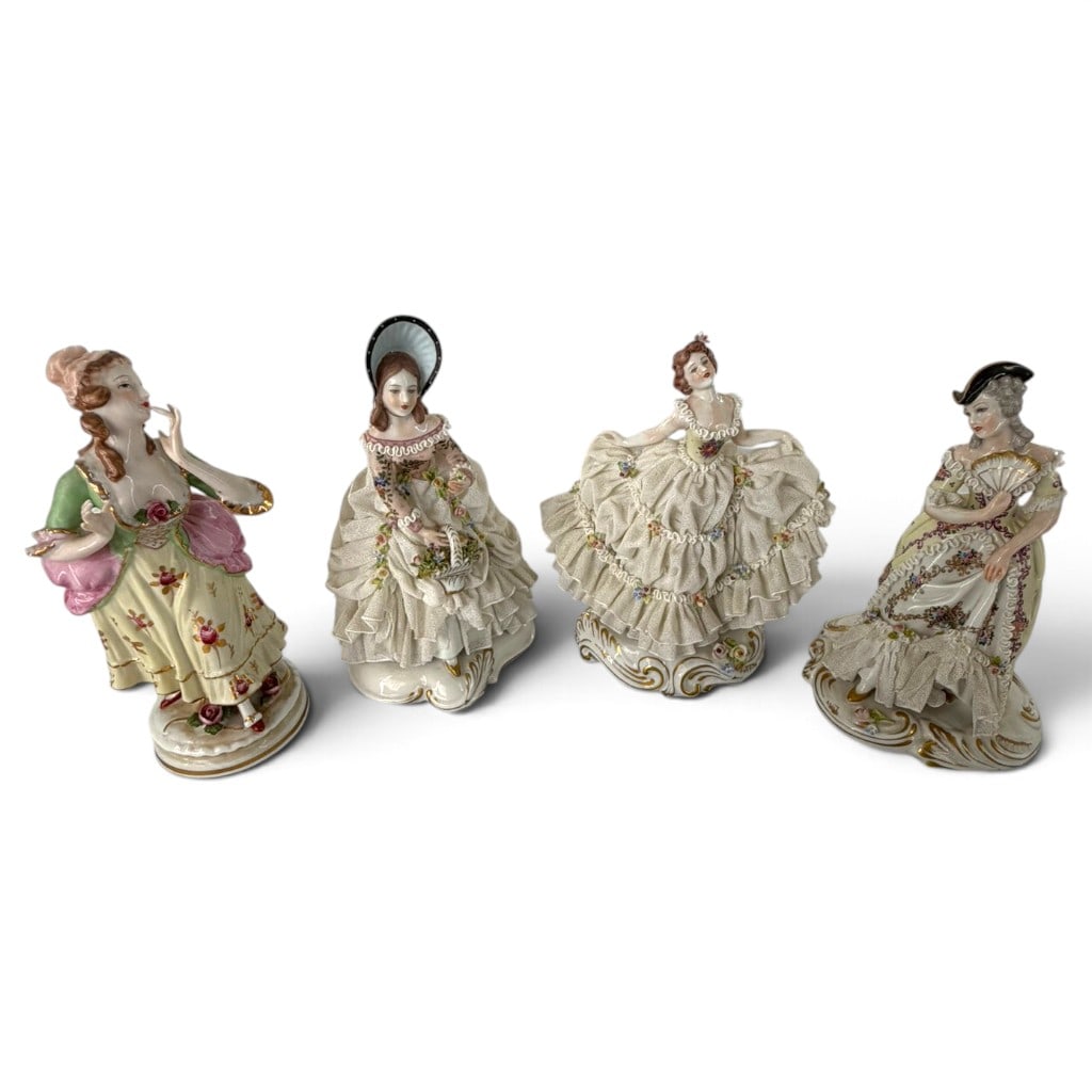 Four Capodimonte-Style Porcelain Ladies: Origin: Italy and Japan Date: Mid to late 20th century Period/Style: Rococo Revival and Capodimonte style Maker: Mixed makers, including Andrea by Sadek Materials: Glazed porcelain with applied porcel