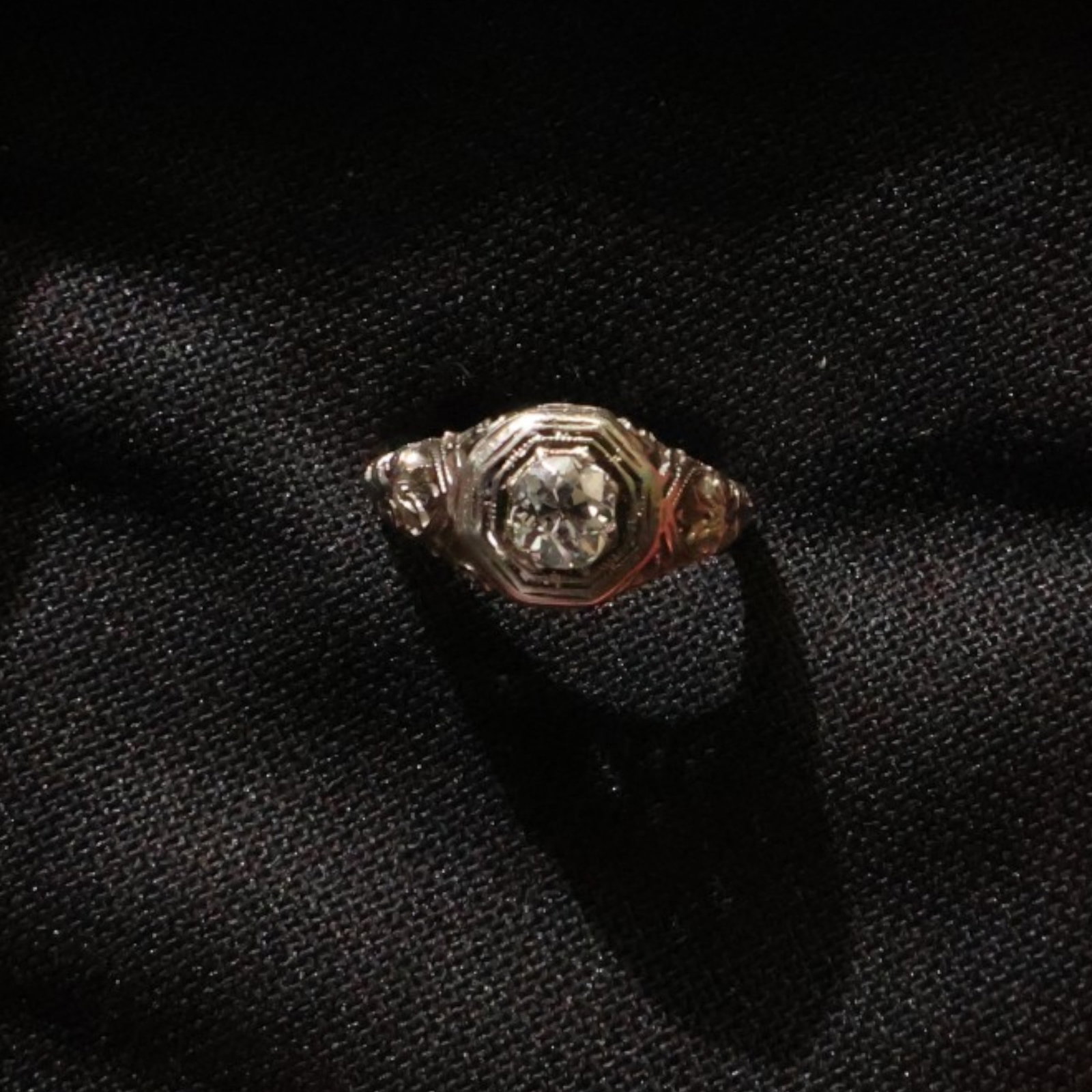 18K White Gold 0.75 CT Diamond Ring: Date: Late 20th to early 21st century Materials: 18K white gold and diamonds Form: Ring Description: An 18K white gold ring centered by an approximately 0.75 carat diamond in a raised setting, with