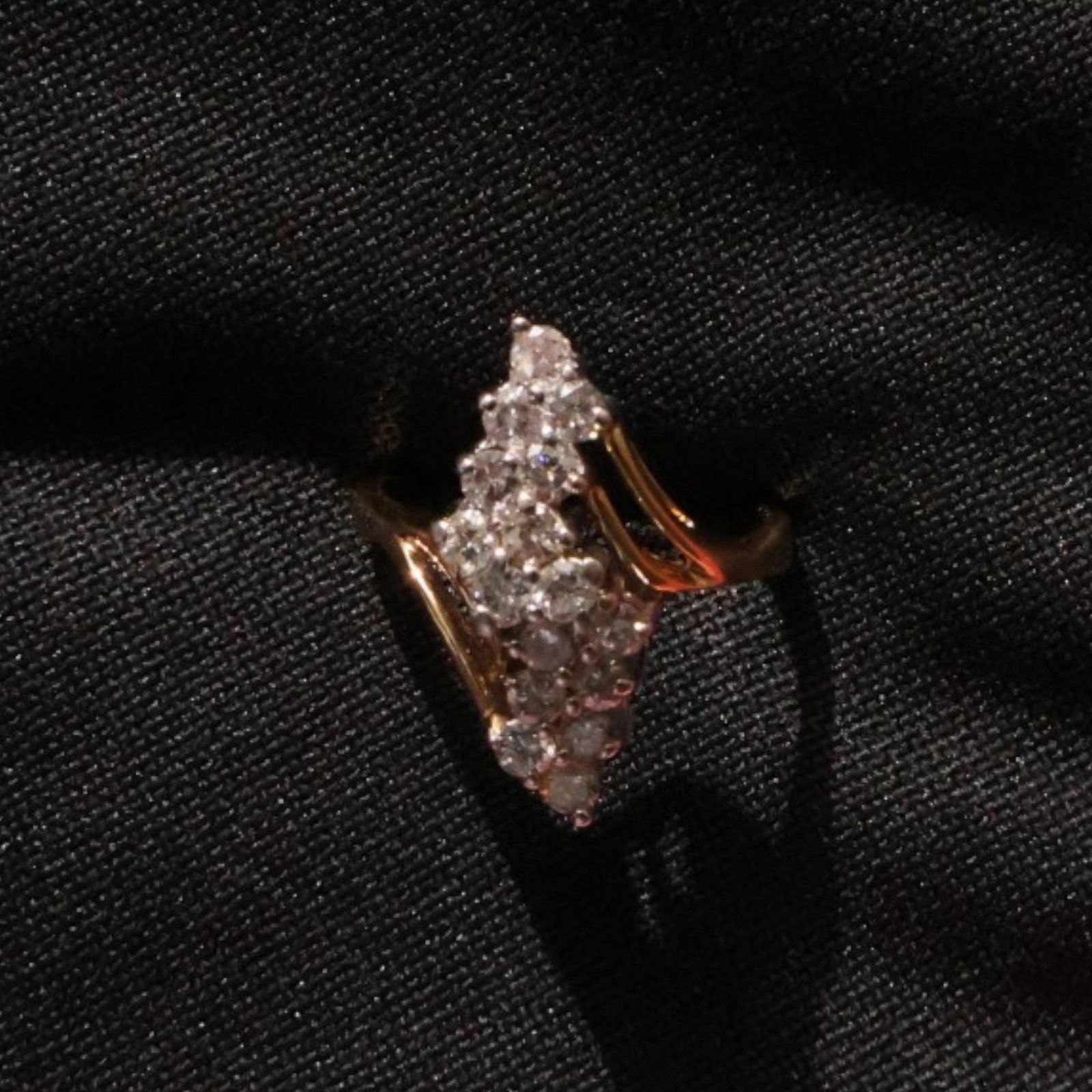 14K Diamond Waterfall Ring: Date: Late 20th to early 21st century Materials: 14K yellow gold and diamonds Form: Waterfall ring Description: A 14K yellow gold waterfall ring with multiple graduated diamond-set rows sweeping acros
