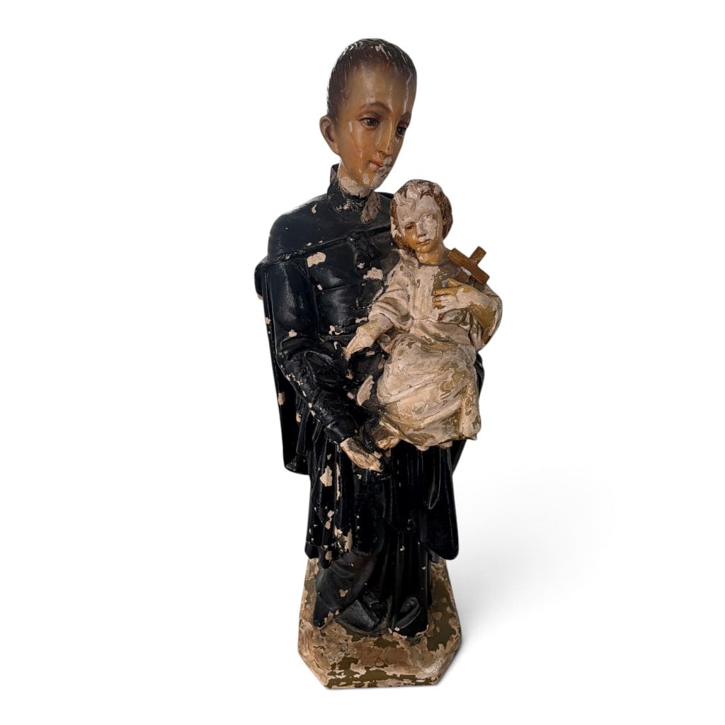 Polychrome St. Anthony and Christ Child: Date: Late 18th to early 19th century Origin: Southern European Materials: Polychrome-painted cartapesta, gesso, and wood Form: Devotional figure Description: A polychrome devotional figure of Saint