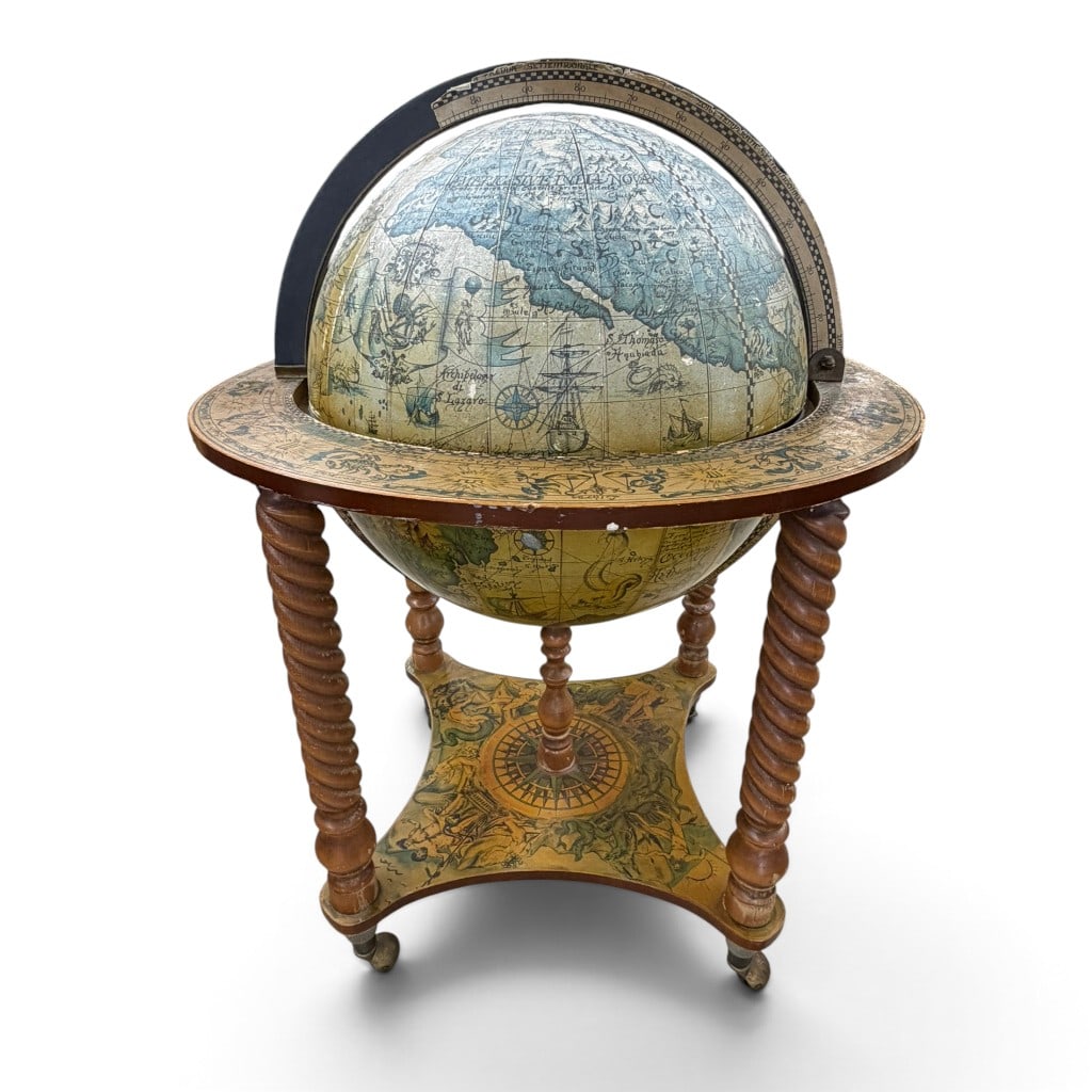 Vintage Zoffoli Bacco Italian Globe Bar: Maker: Zoffoli, Rimini, Italy. Model: Bacco. Date: Late 20th century. Description: Vintage Italian terrestrial globe-form rolling bar with reproduction 16th-century cartography, zodiac and calendar