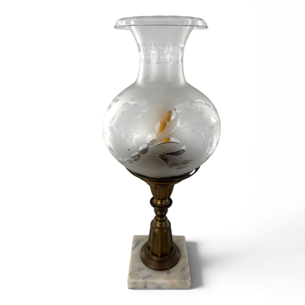 Victorian Brass and Marble Solar Lamp: Date: Mid-19th century Origin: American Materials: Brass, frosted and cut glass, marble, and electrical fittings Form: Solar lamp Description: A Victorian solar lamp with a frosted glass globe shade c